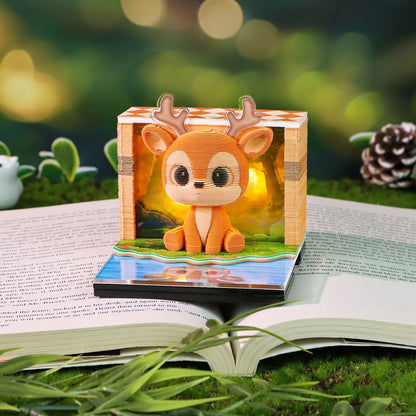 Wooden deer figurine on an open book with a blurred natural background