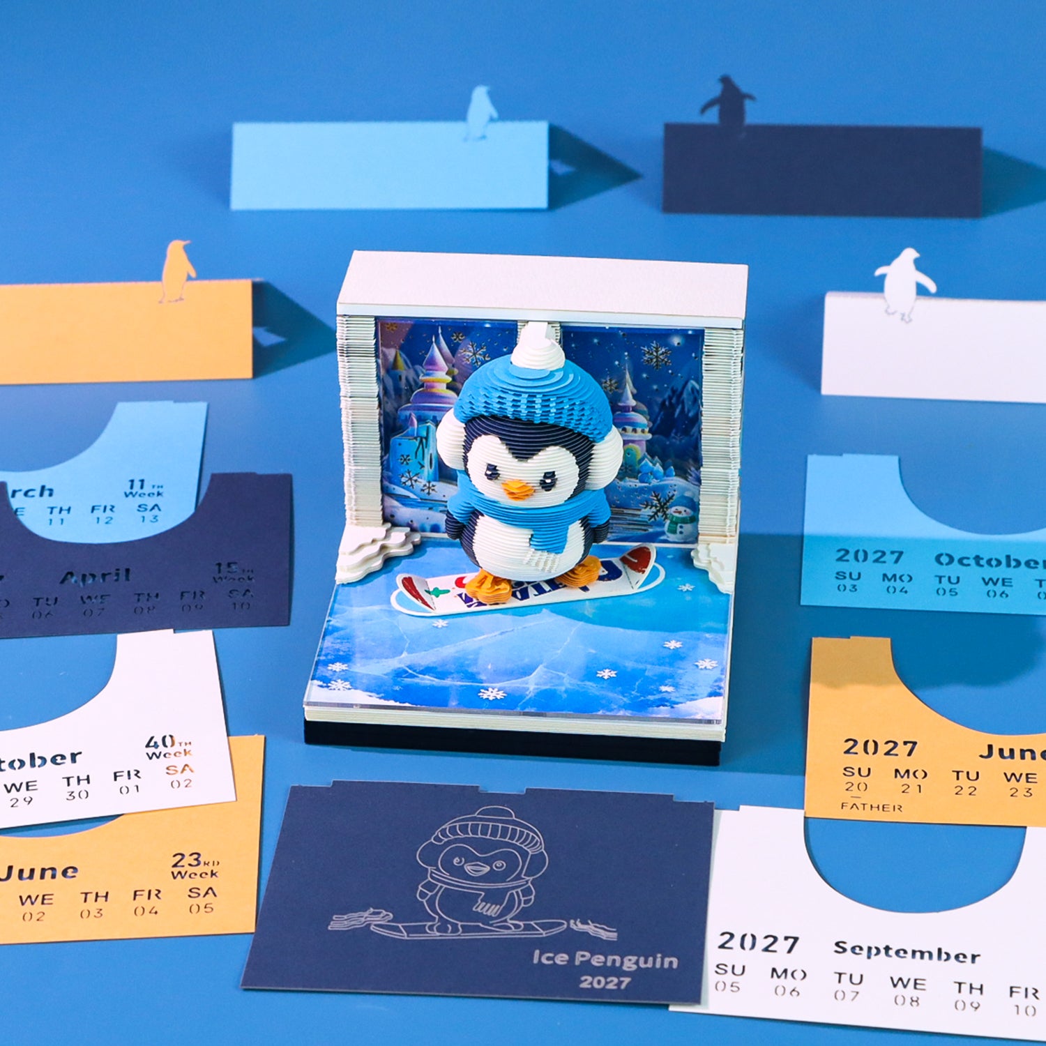 3D Calendar with a penguin design on a blue background